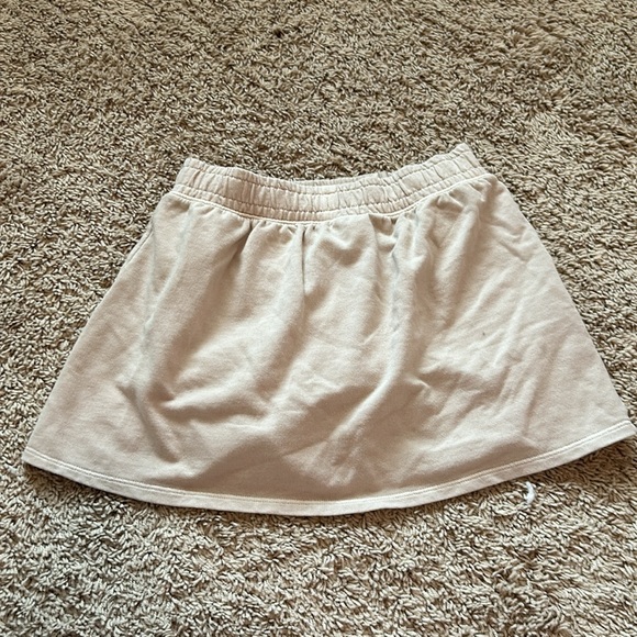Tan skirt with a built in short underneath. adorable - Picture 2 of 3